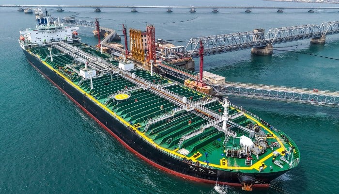 This aerial photo shows a tanker unloading imported crude oil at a terminal port in Qingdao, in Chinas eastern Shandong province on June 25, 2026. — AFP