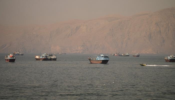Vessels at the Strait of Hormuz, as seen from Musandam, Oman, June 18, 2026. — Reuters