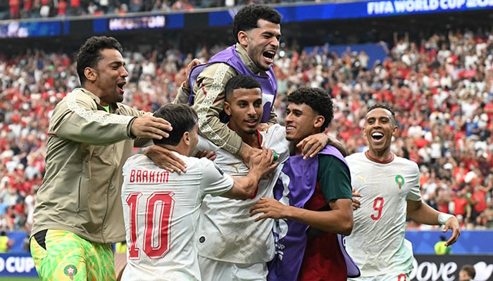 Moroccos midfielder #08 Azzedine Ounahi celebrates scoring his teams second goal with teammates during the 2026 World Cup round of 16 football match between Canada and Morocco at the Houston Stadium in Houston on July 4, 2026. — AFP